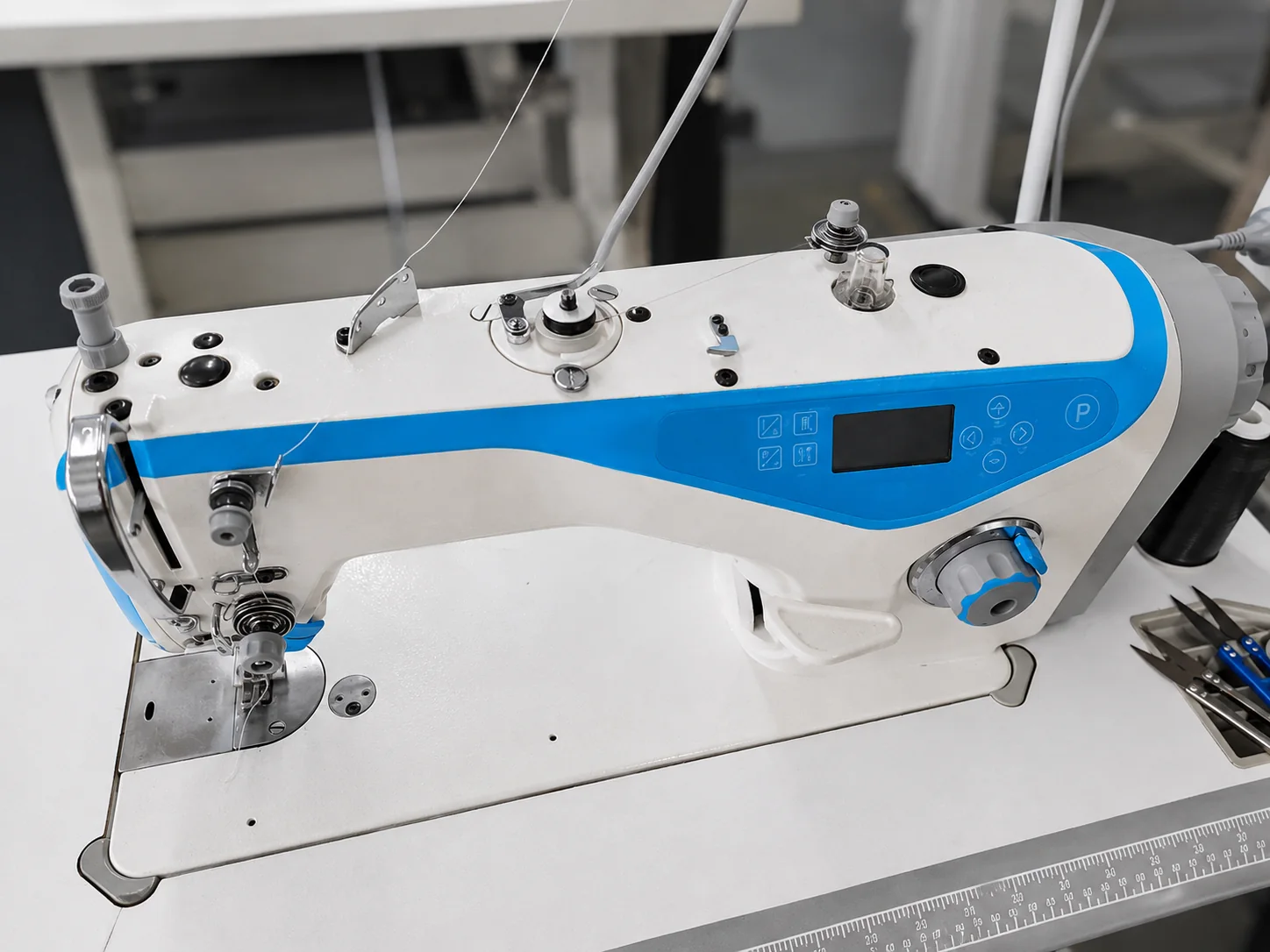 Industrial sewing station for SoftLustre mulberry silk accessories
