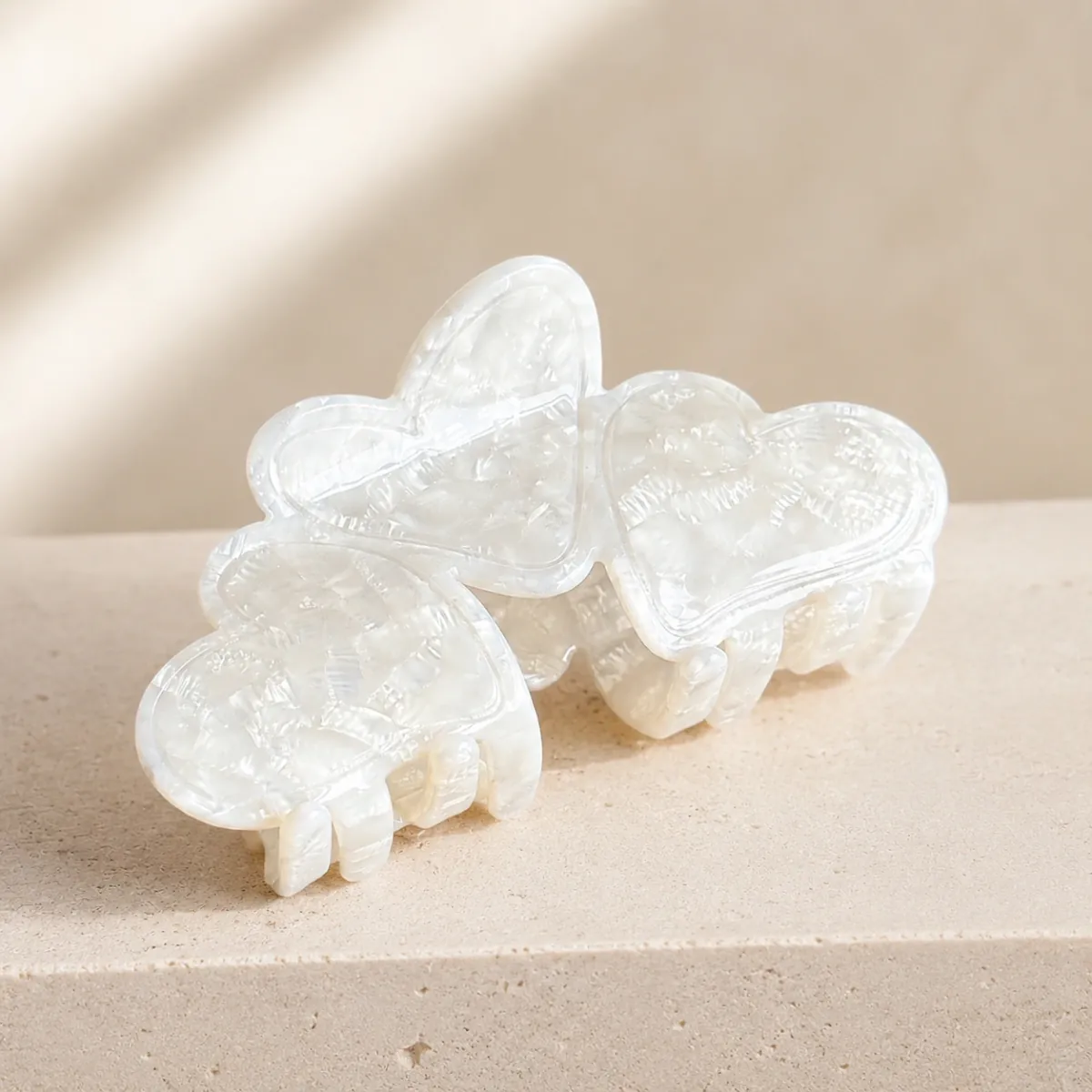 Moonlit Pearl heart claw clip — still life