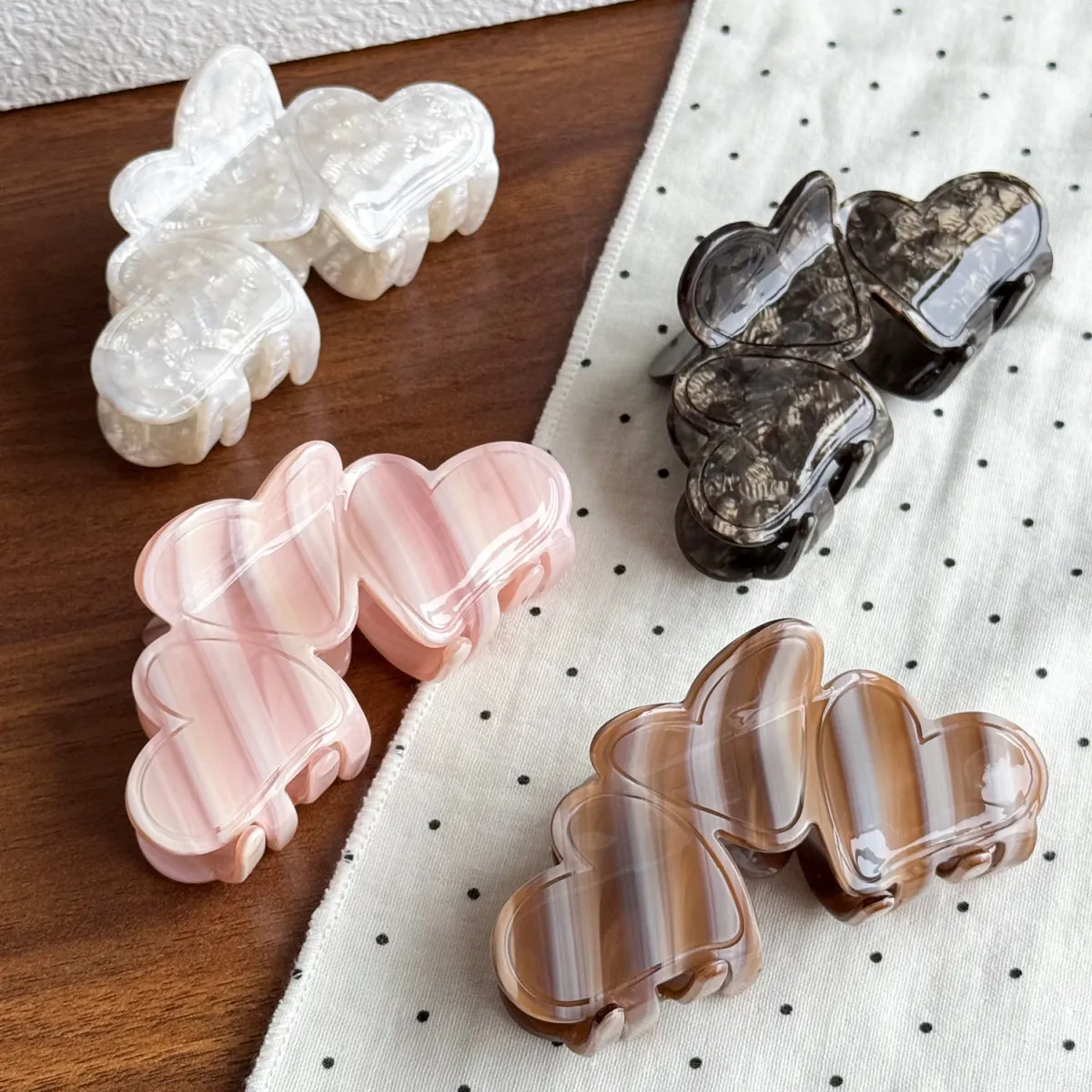 Moonlit Pearl, Smoky Quartz, Caramel Veil, and Blush Veil Amour Loop acetate claw clips