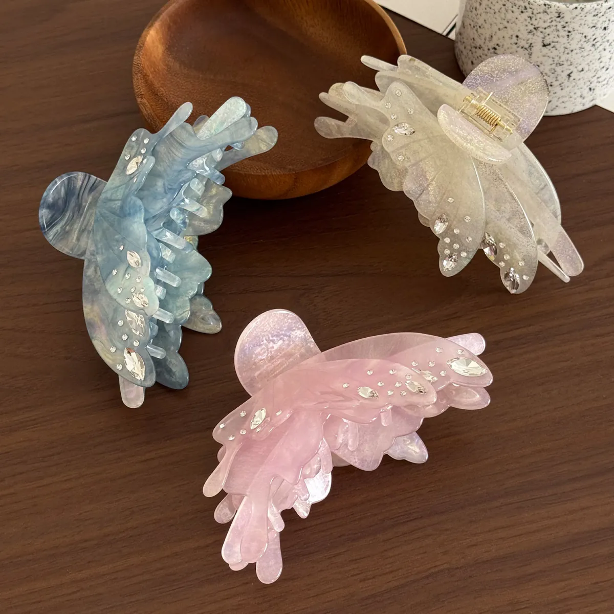 Ivory, Light Blue, and Pink Luminous Papillon acetate butterfly claw clips