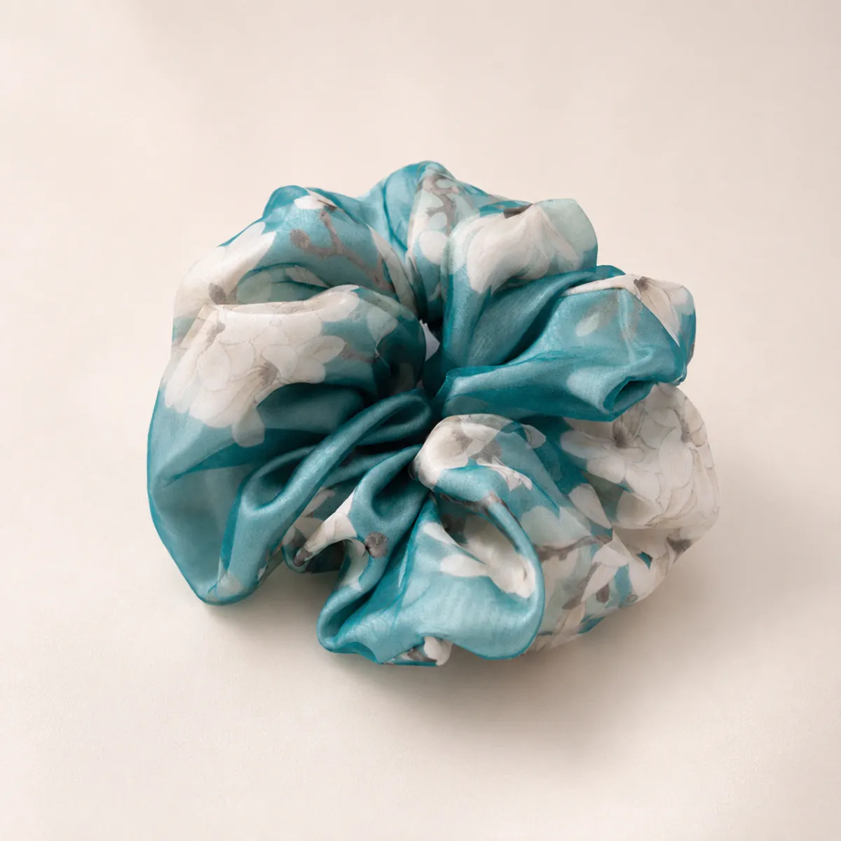 Monet Floral ArtBloom silk scrunchie — still life