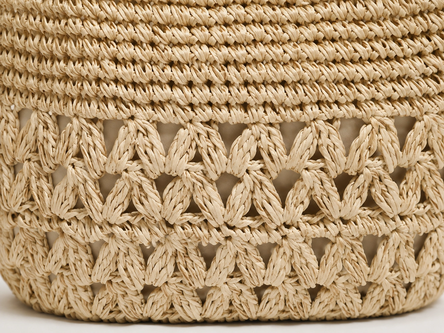 Twin dark-brown tassels at the strap knot