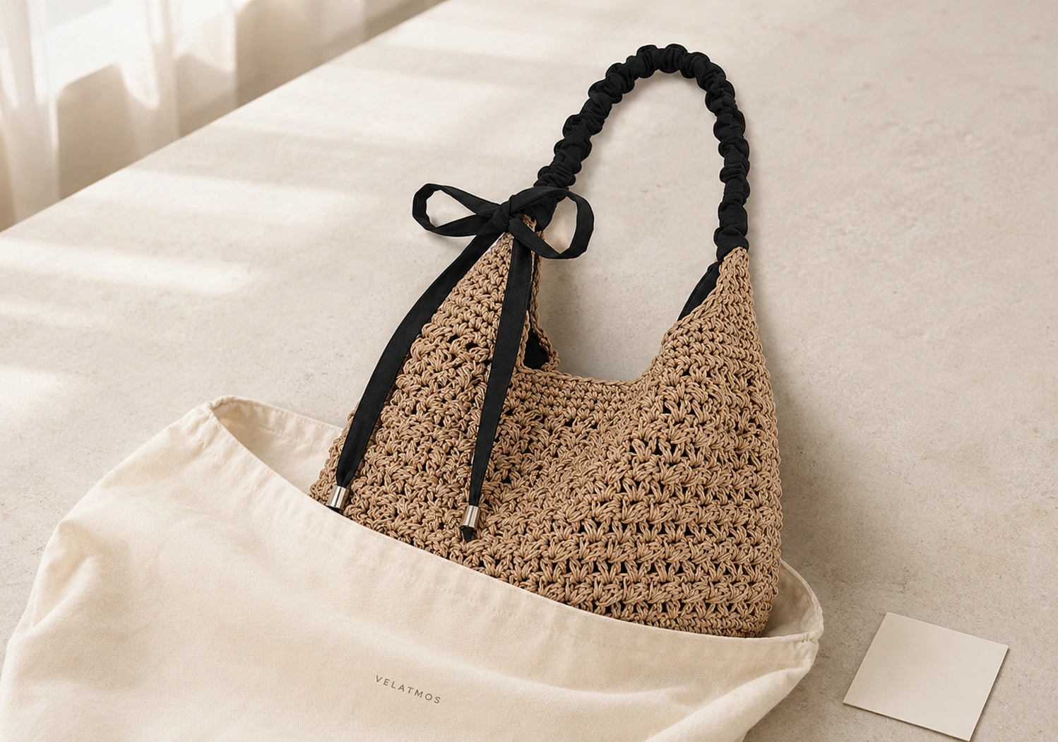 Noire Bow hobo with Velatmos dust bag and care card
