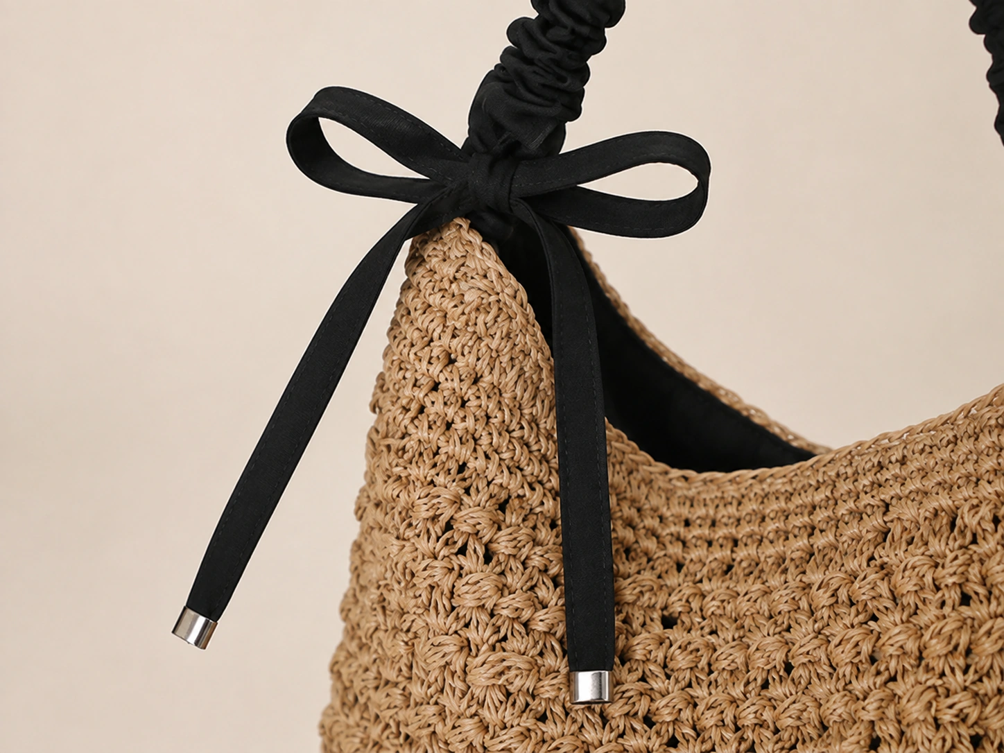 Black bow with silver-tone strap tips